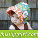 This Lil Piglet Boutique - Baby Bonnets, designer kids clothing, toys, kids jewelry, children's shoes, maternity and more.